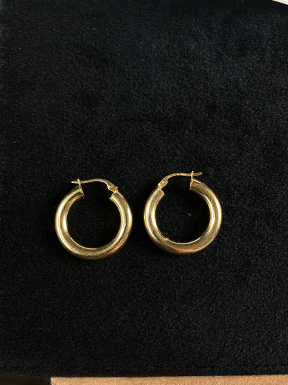 Aretes redondos en Oro 18k